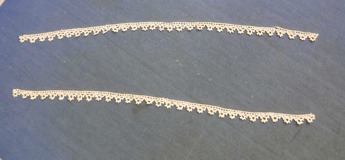 Two pieces of lace ready to be used as an embellishment
