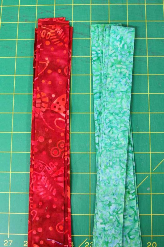The accent strips on the left and the binding strips on the right are cut