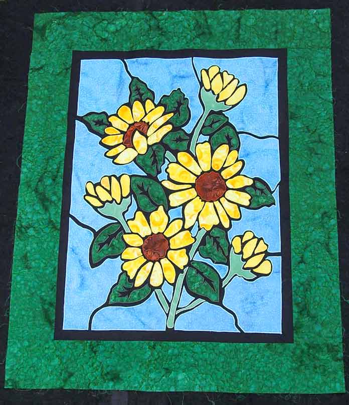 The sunflower wallhanging is basted and ready to be quilted.