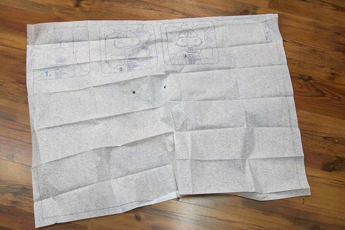 Pattern pieces are printed on tissue paper
