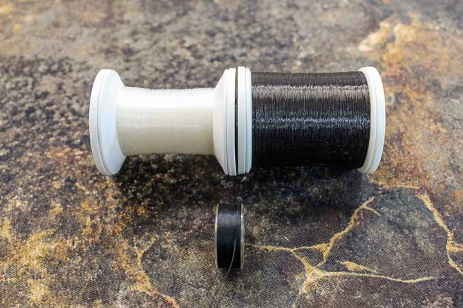 Invisible (monofilament) thread in clear and smoke with a pre-wound bobbin with bobbin weight thread