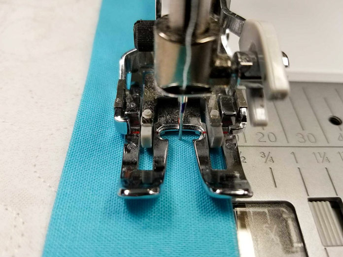 Sewing the binding on with the walking foot
