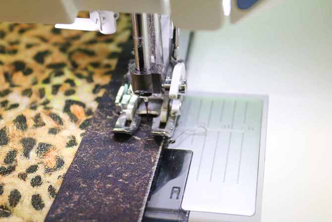 Use a line on the walking foot for a guide for the seam allowance width