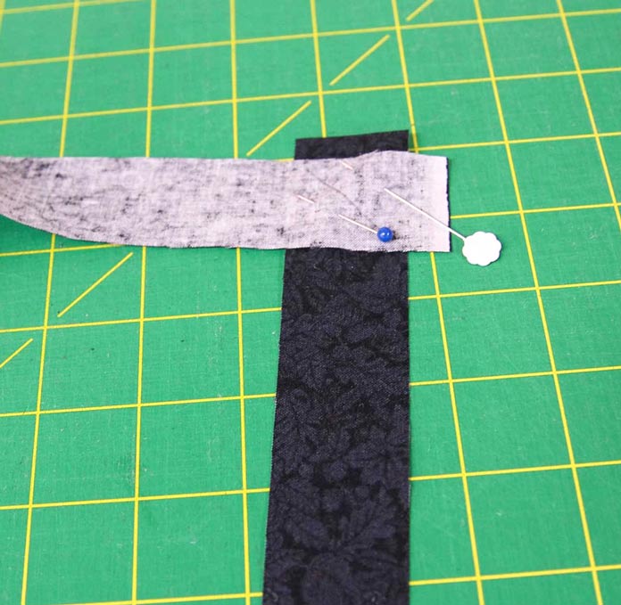 Join the binding strips with a diagonal seam.