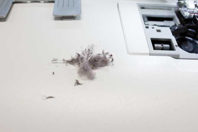 I used the brush to remove this lint. Imagine what that will do to the tension of the sewing machine. Bad news!