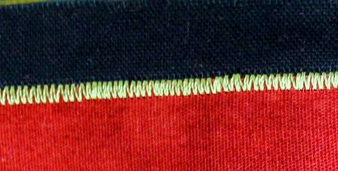 The satin stitch is a fairly dense stitch which is thick. If you use the Utility Foot A, the thickness of the satin stitch has no room to form properly under the foot. If you use Presser foot B when you satin stitch, the groove on the underside of the foot allows the fabric and the satin stitch to flow freely underneath preventing any jamming. A small detail, but can make the difference between a nice satin stitch and a mess!!!!!!!!!!!!