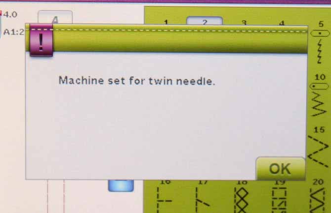 Pop up warning for the use of the twin needle setting when the sewing machine is turned on.