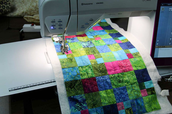 Large work area to the right of the needle makes for easier quilting.