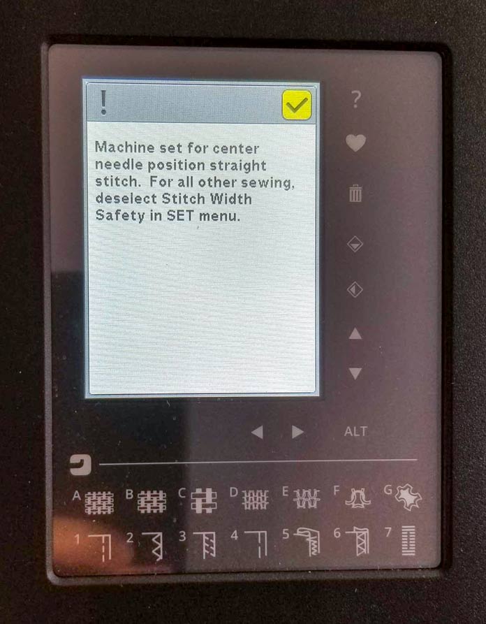Pop up message warning that the straight stitch plate is on the sewing machine