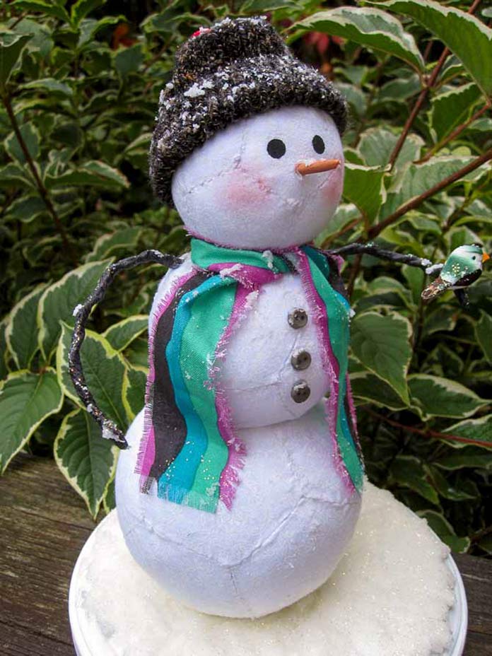 Percy is a snowman created using paper piecing.