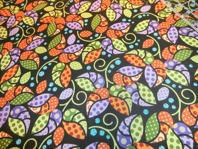 Overall leaf print fabric selected for the outer border of a landscape table runner. Northcott Urban Elementz.