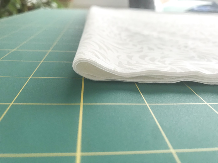 Folding a piece of fabric onto itself with make it easier to cut long strip of fabric. A TrueCut tutorial on how to use the TrueCut System including: TrueCut My Perfect Rotary Cutter, TrueCut 360º circle cutter, TrueCut Rulers and TrueCut Grips