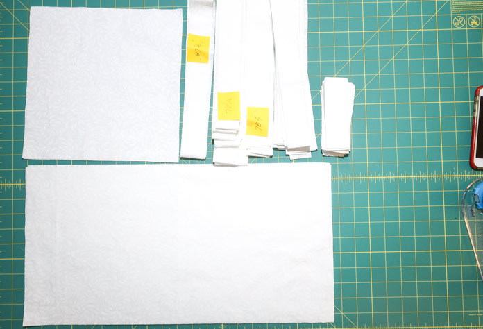Keep your cut fabrics separated in individual piles and identify the length of the strips.
