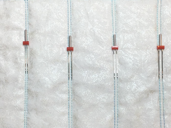 A test stitch out of a variety of twin needles