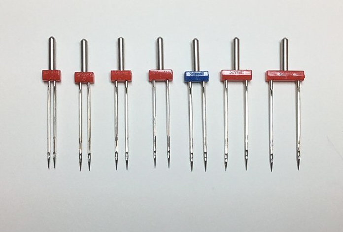 A variety of SCHMETZ twin needles appropriate to quilting