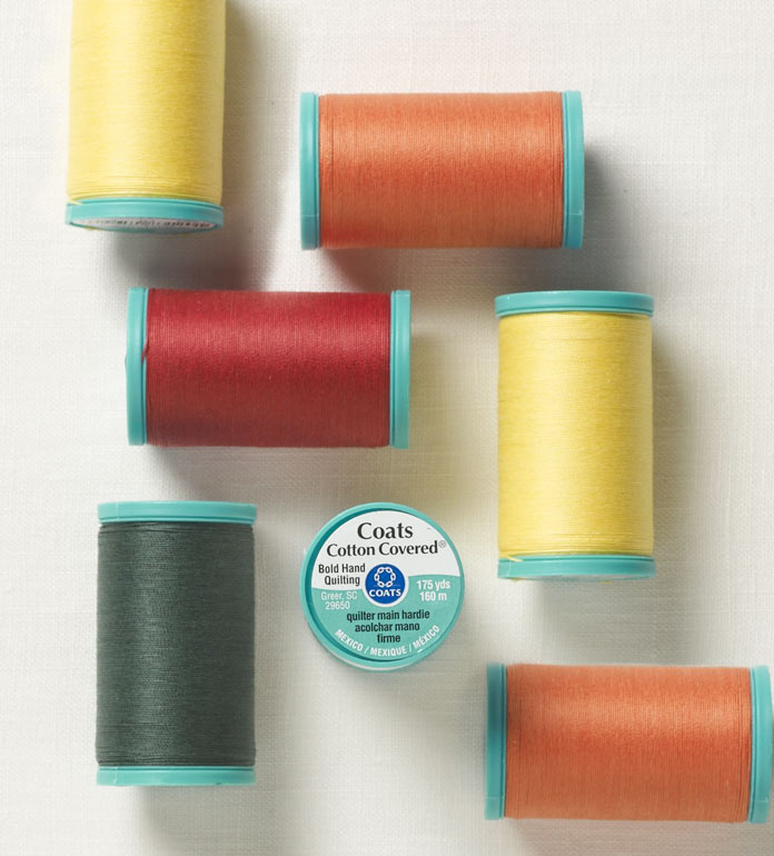 Colorful spools of Coats Bold Hand Quilting Thread