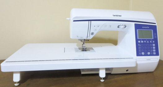 Brother NQ900 sewing machine with wide table attached