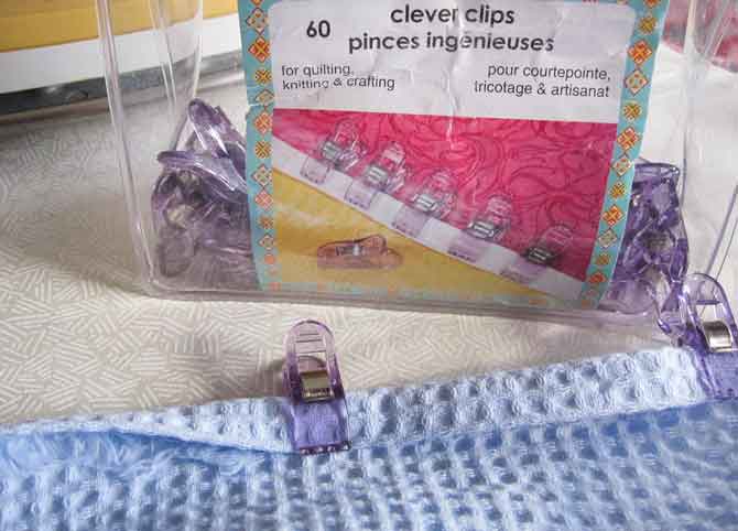 Use Clever Clips to turn under the side hem of the waffle weave. Space them wide enough so that ...