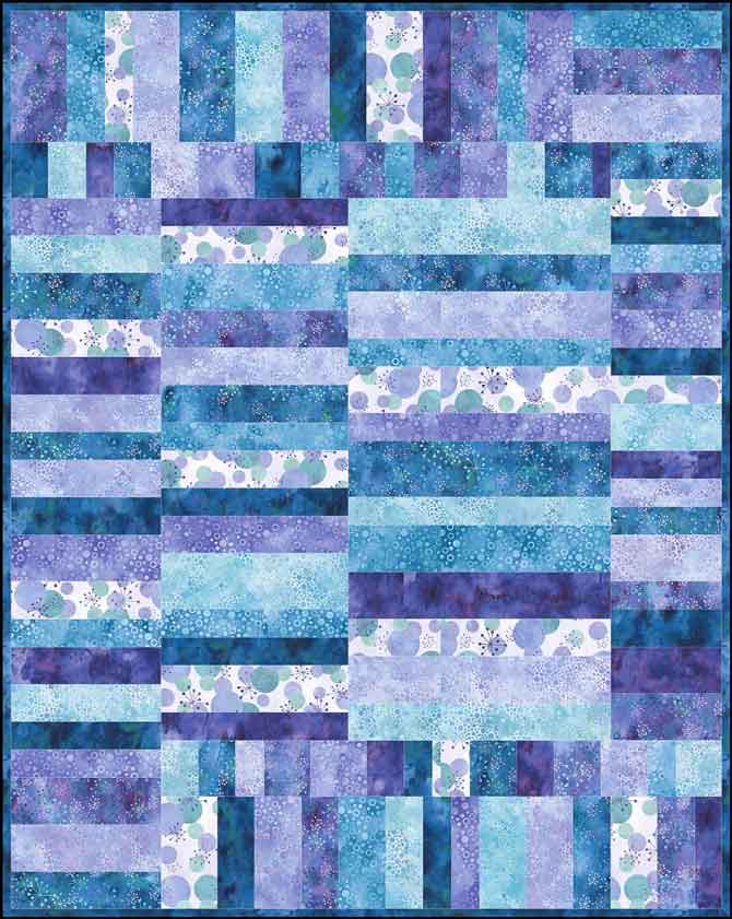 Modern baby quilt using the purple Cosmic Fusion fabric from Northcott
