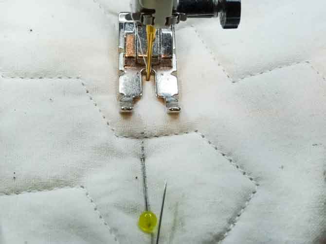 Sewing ⅛ʺ on the outer edge of line
