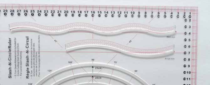 The Komfort KUT Slash-N-Circle section of the ruler showing the two possible curves that the ruler offers.
