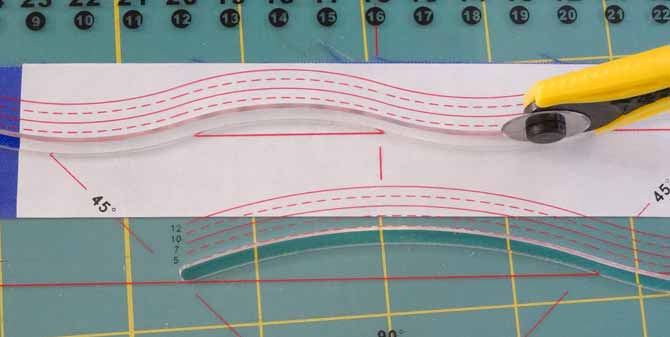 A first curve is being cut using the Komfort KUT Slash-N-Circle Ruler.