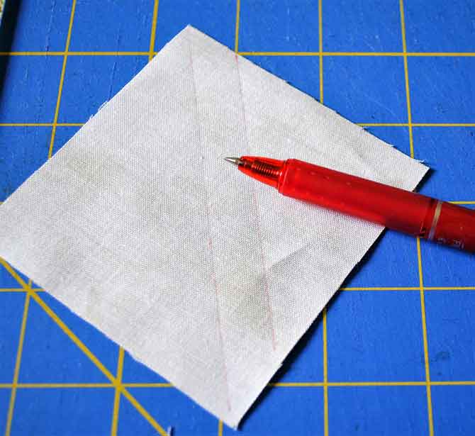 Marking the back of the squares for making flying geese blocks