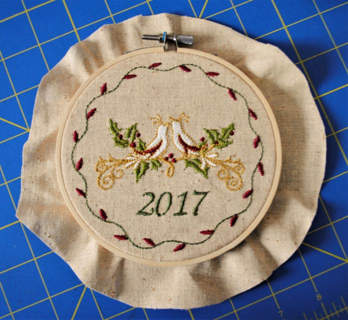 Insert into embroidery hoop