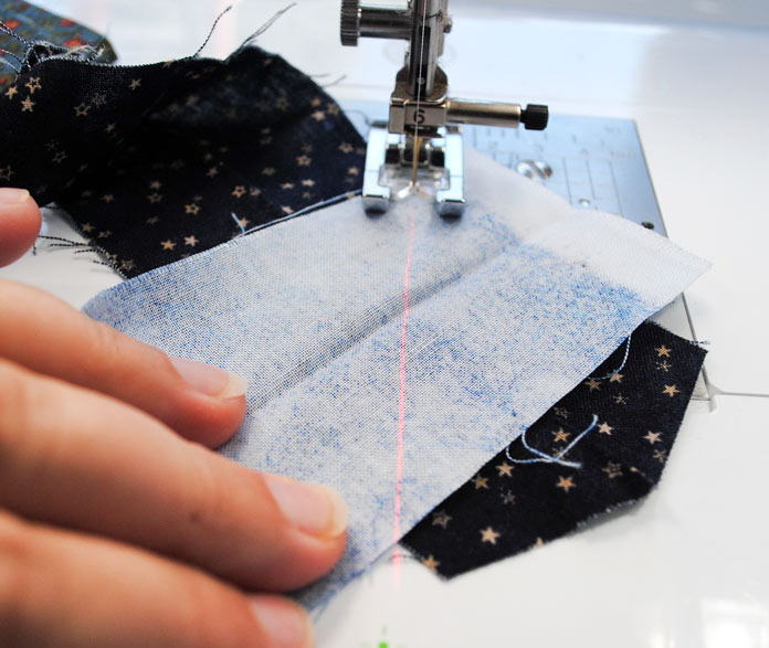 Sew bindings together with a mitred seam