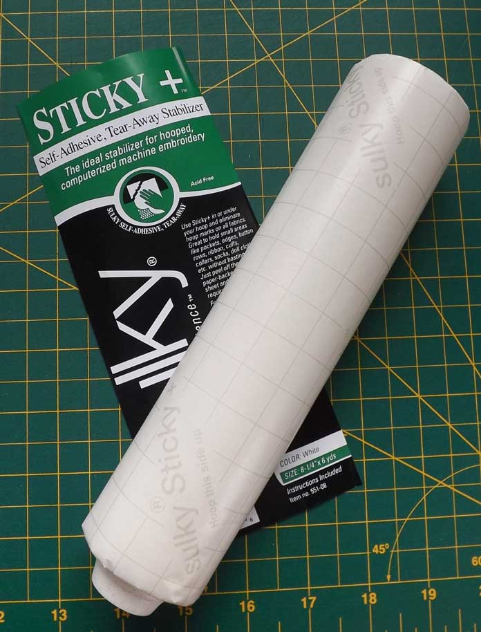 Sulky Sticky + self adhesive stabilizer is great for embroidering oddly shaped items - tutorial on how to make quilt labels using machine embroidery and ribbons on the Brother Dreamweaver XE
