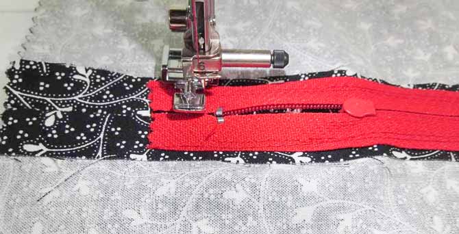 Sewing the zipper in the seam using the zipper foot
