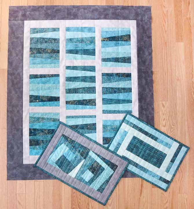Quilt top and placemats made with Northcott's Artisan Spirit Shimmer, Artisan Spirit Echoes, and Toscana fabrics.