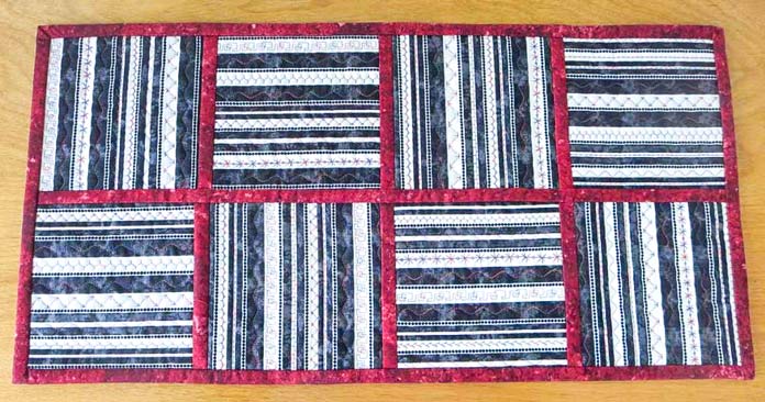 Table runner with decorative stitching