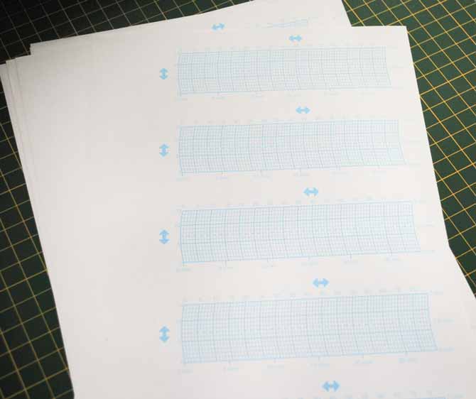 The NQ900 sewing machine comes with several pages of grid paper that can be used for design with My Custom Stitch.