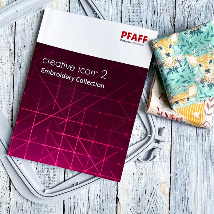 PFAFF creative icon 2 sewing machine Embroidery Collection manual; two fat quarters of cotton fabric and PFAFF Elite Hoop 260 x 200 mm
