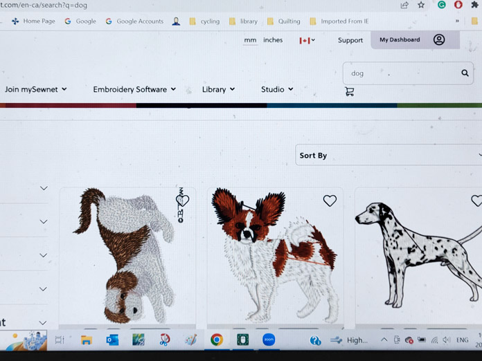 A computer screen with three dog embroidery designs; Husqvarna Viking Designer EPIC 2, Husqvarna Viking Adjustable Stitch in the Ditch Foot for IDF system, Inspira Tear-A-Way Stabilizer, Husqvarna Viking Multi-Function Foot Control, Husqvarna Viking Designer Royal Hoop; mySewnet embroidery software