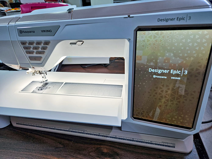 A white and gold sewing machine