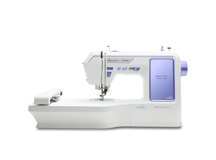 A white sewing machine with a mauve screen; Husqvarna VIKING Designer Quartz 29, mySewnet Machine Embroidery Software