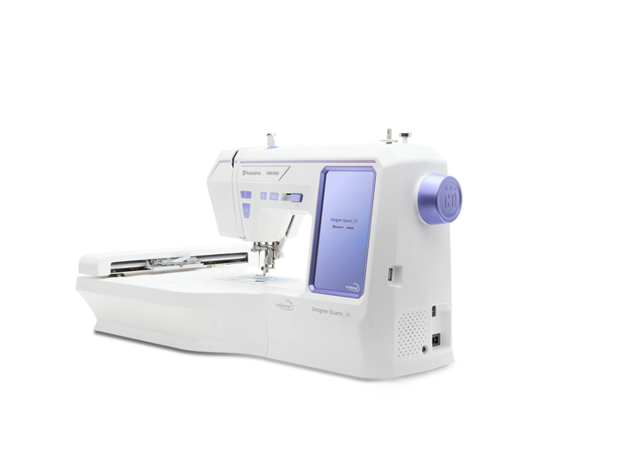 A white and purple sewing machine; Husqvarna VIKING Designer Quartz 29, mySewnet Machine Embroidery Software, Husqvarna VIKING Tear-a-Way Light Stabilizer 15 Inches x 25 Yards