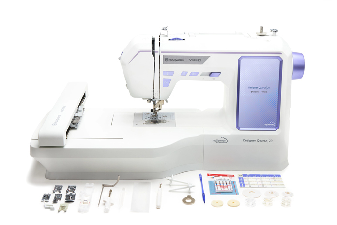 A white and purple sewing machine with accessories; Husqvarna VIKING Designer Quartz 29