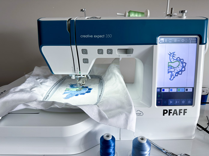 A photo of the new PFAFF creative expect 350; quilting, mini quilt, mySewnet Quilting Software, digital quilting, quilt design, beginner quilting, quilt planning, fabric yardage, quilting techniques, embroidery and quilting