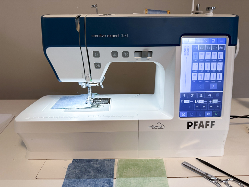 A photo of the new PFAFF creative expect 350; quilting, mini quilt, mySewnet Quilting Software, digital quilting, quilt design, beginner quilting, quilt planning, fabric yardage, quilting techniques, embroidery and quilting; mySewnet Quilting Software, PFAFF creative expect 350, mini quilt tutorial, beginner quilting, machine embroidery techniques, applique embroidery, sewing and quilting, quilt assembly, machine embroidery tips, DIY quilt projects, PFAFF, sewing machine reviews, quilting tutorials, free quilting patterns