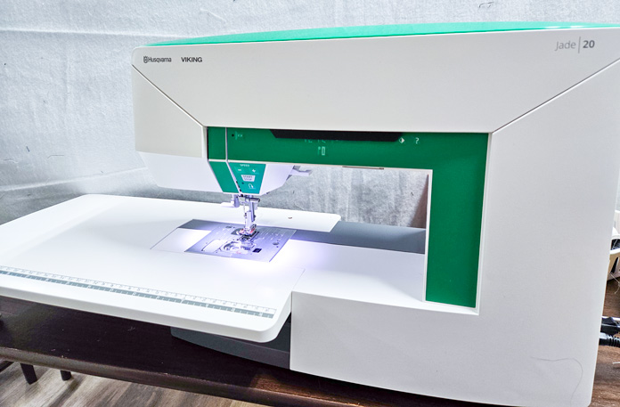A green and white sewing machine; Husqvarna VIKING Jade 20 sewing machine