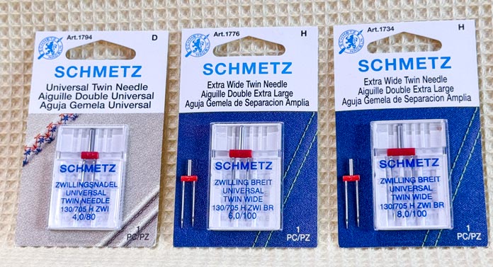 Three of 16 SCHMETZ Twin needle types 