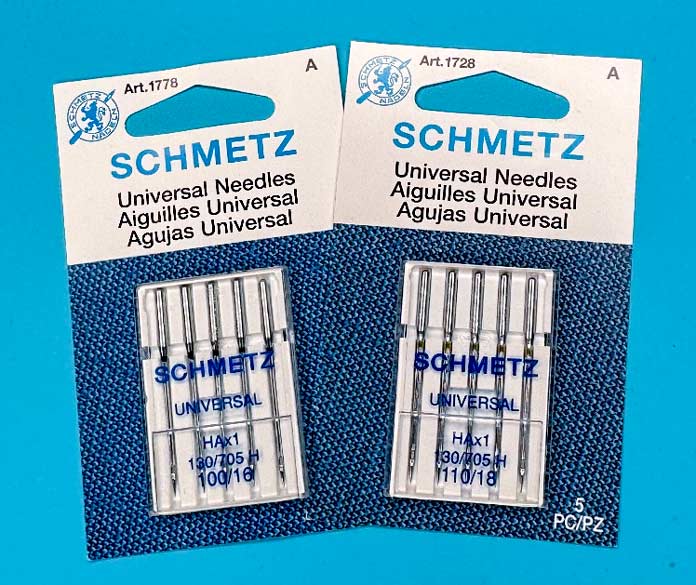 packages of SCHMETZ Universal 110/16 and 110/18 needles.