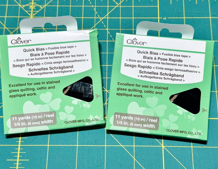 Two packages of Clover Quick ¼” black Bias Tape