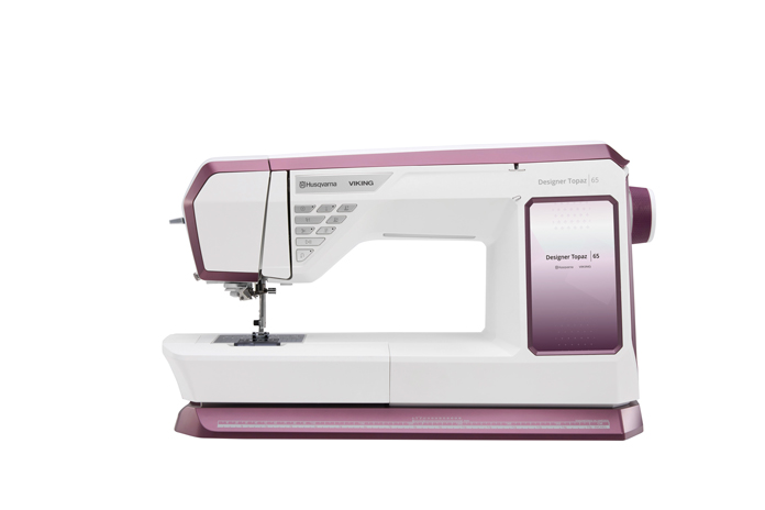 A white embroidery machine; Husqvarna VIKING Designer Topaz 65