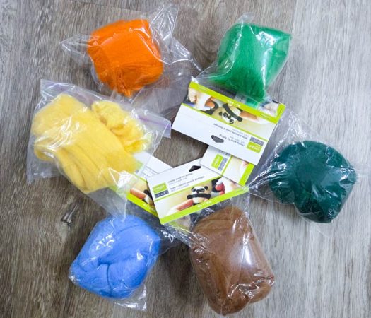 Six bags of wool roving in various colors; UNIQUE Craft wool roving 