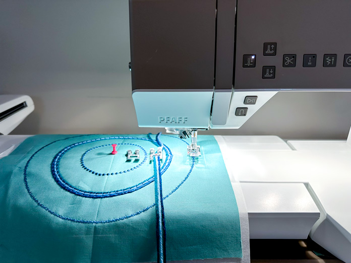 PFAFF Circular Attachment installed on a PFAFF creative elevate 680 with embroidery arm not fully engaged.