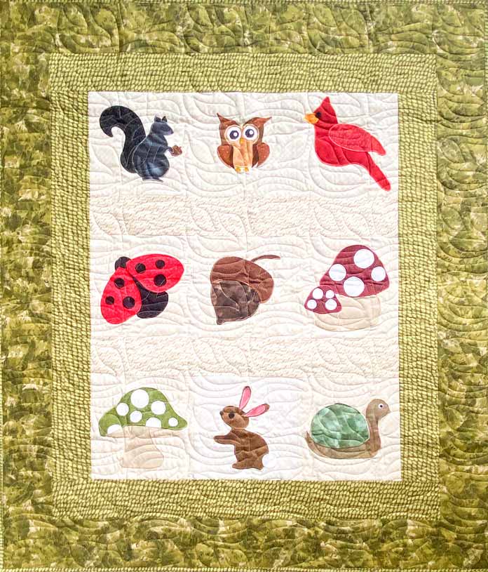 Friends of the Forest Baby Quilt pattern from ANPTmag Issue 67; photo by Carla A. Canonico
